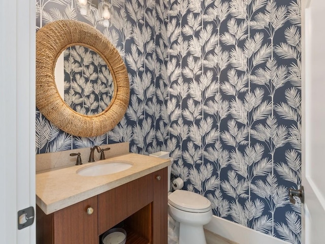 1618 W Sandpointe Pl, Vero Beach, FL 32963 - bathroom with wallpapered walls and vanity