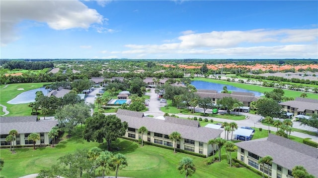 bird's eye view with a residential view, view of golf course, and a water view