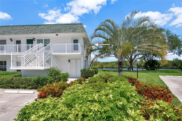 exterior space featuring a front lawn