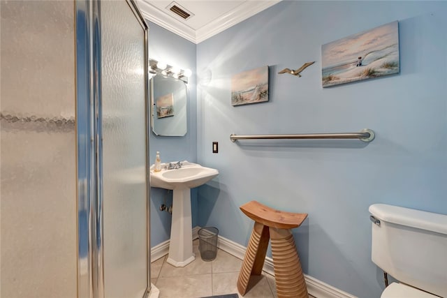 bathroom with toilet, an enclosed shower, tile patterned floors, and ornamental molding