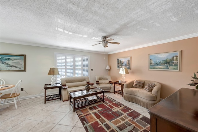 living room with ceiling fan, a textured ceiling, light tile patterned floors, and ornamental molding