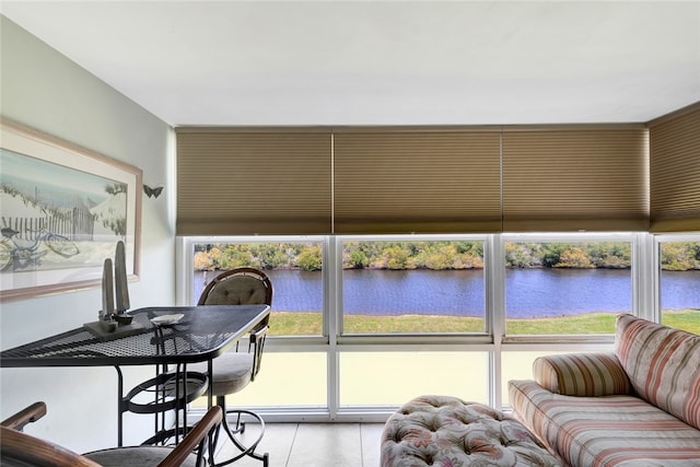 sunroom with a water view