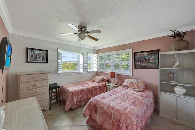 bedroom featuring ornamental molding, a textured ceiling, ceiling fan, and light tile patterned floors