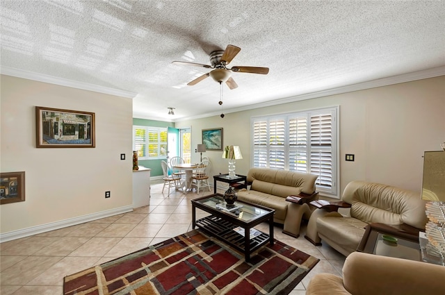 living room featuring a textured ceiling, light tile patterned flooring, crown molding, and ceiling fan