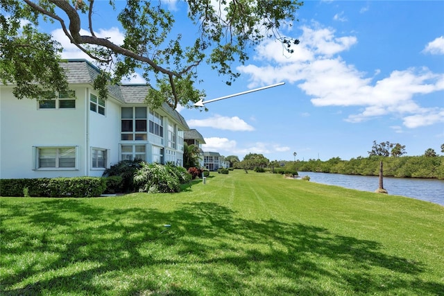 view of yard with a water view