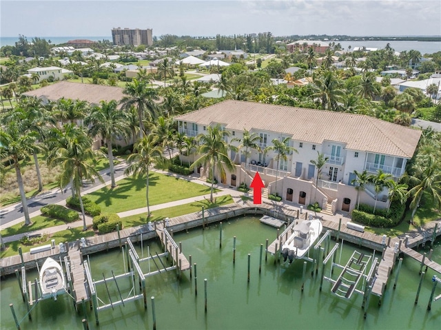 bird's eye view with a water view