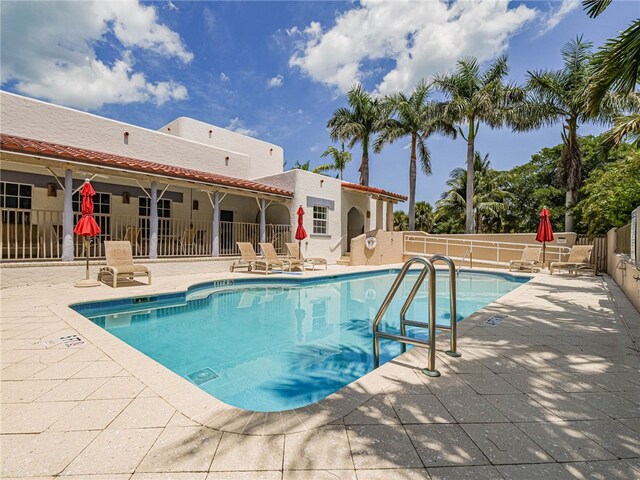 view of swimming pool featuring a patio