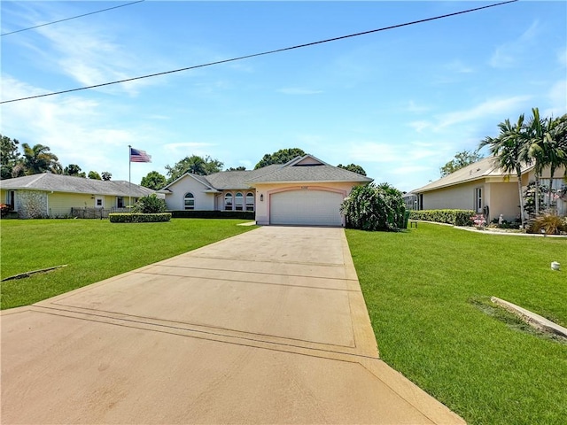 5207 Indian Bend Ln, Fort Pierce, FL 34951 - ranch-style house featuring a front lawn, concrete driveway, and an attached garage