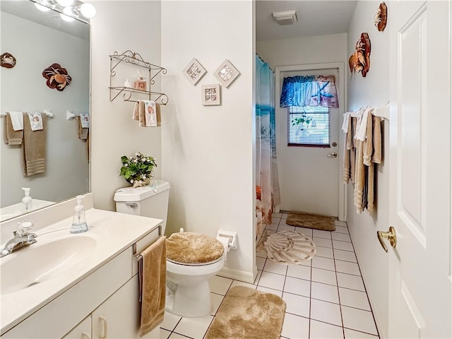 full bath with a shower with shower curtain, toilet, tile patterned flooring, and vanity