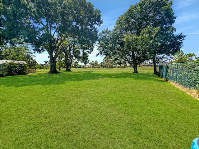 view of yard with fence