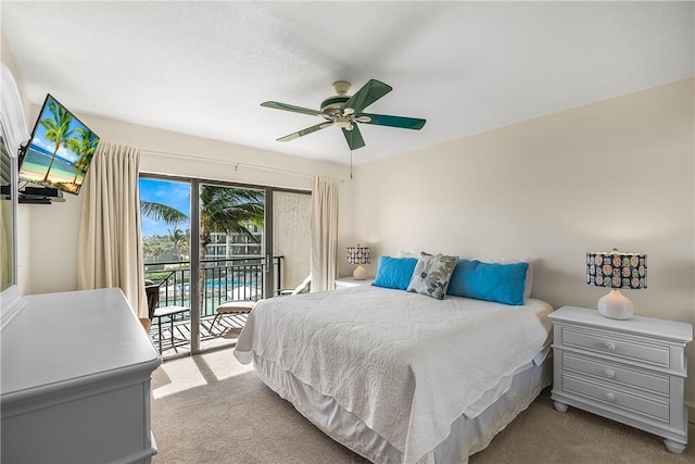 bedroom featuring light carpet, multiple windows, access to outside, and ceiling fan