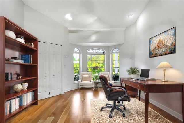 office space with light wood-type flooring