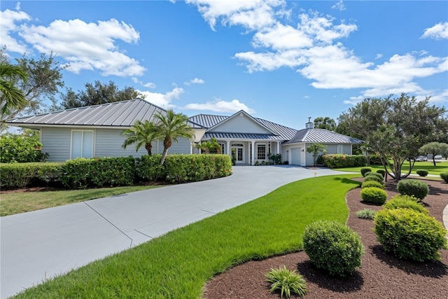 ranch-style home with a front lawn