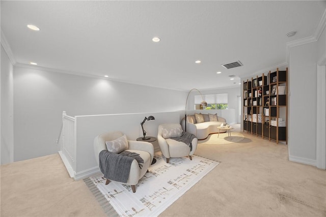 living area with light colored carpet and crown molding