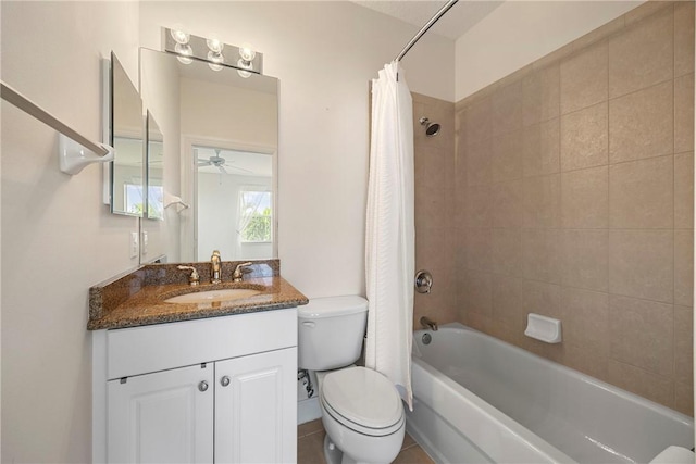 full bathroom featuring ceiling fan, shower / bath combination with curtain, toilet, and vanity