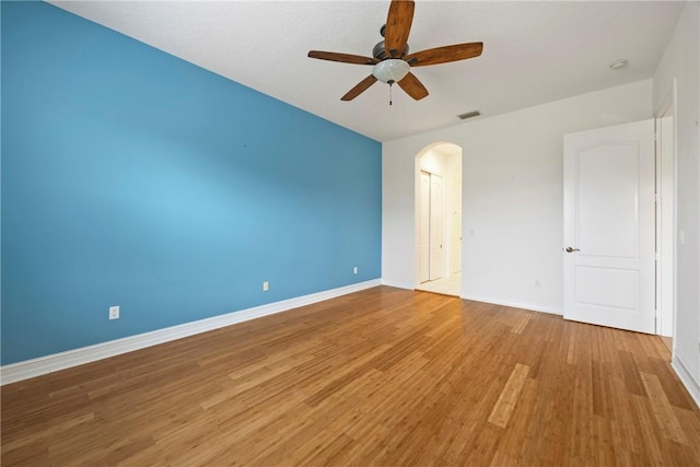 unfurnished bedroom featuring ceiling fan and light wood-type flooring