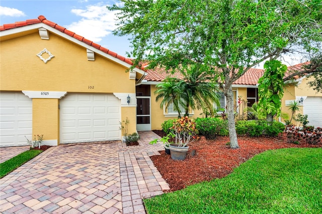 view of front of home featuring a garage