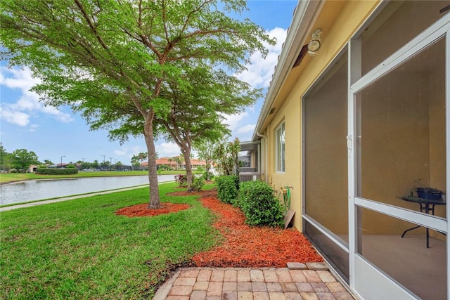 view of yard featuring a water view