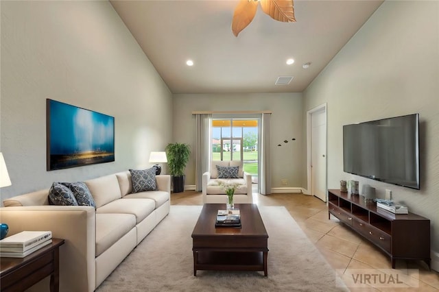 tiled living room featuring ceiling fan