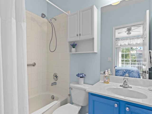 ensuite bathroom with shower / bath combination with curtain, vanity, ensuite bathroom, and toilet