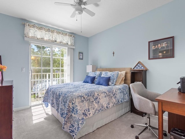 bedroom featuring baseboards, carpet, a ceiling fan, and access to outside