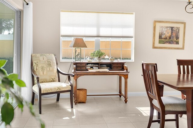 living area with light tile patterned floors