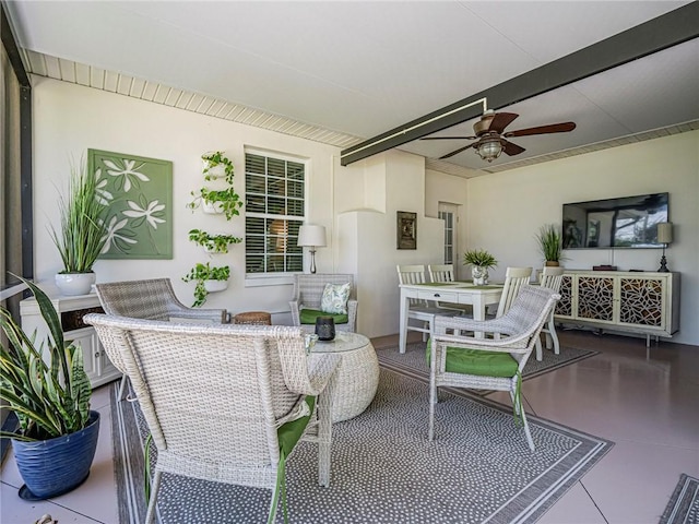 view of patio / terrace featuring outdoor dining area and a ceiling fan