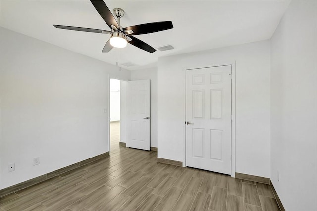 unfurnished bedroom with ceiling fan