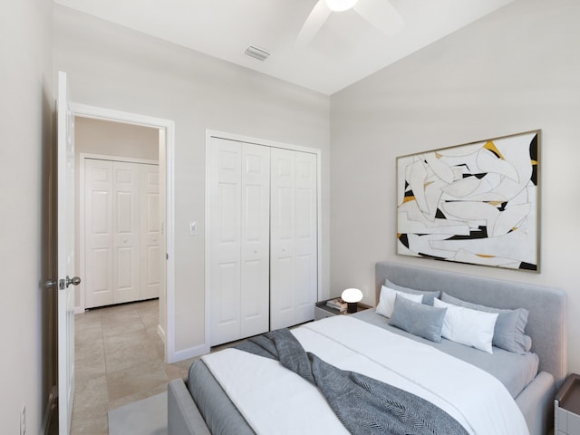 bedroom featuring ceiling fan and light tile patterned flooring