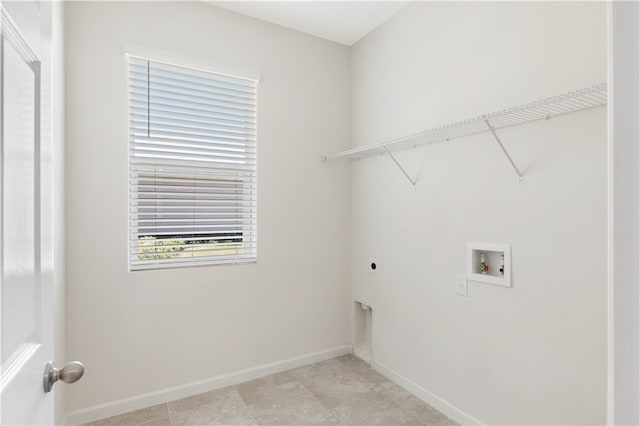 washroom featuring washer hookup and electric dryer hookup