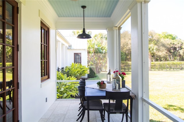 sunroom with wood ceiling