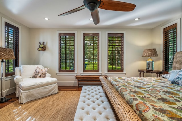 bedroom featuring hardwood / wood-style flooring and ceiling fan