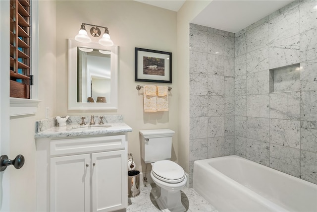 full bathroom with tile patterned floors, vanity, toilet, and tiled shower / bath