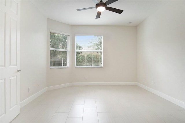 unfurnished room featuring ceiling fan