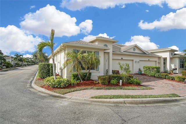 view of front of property with a garage