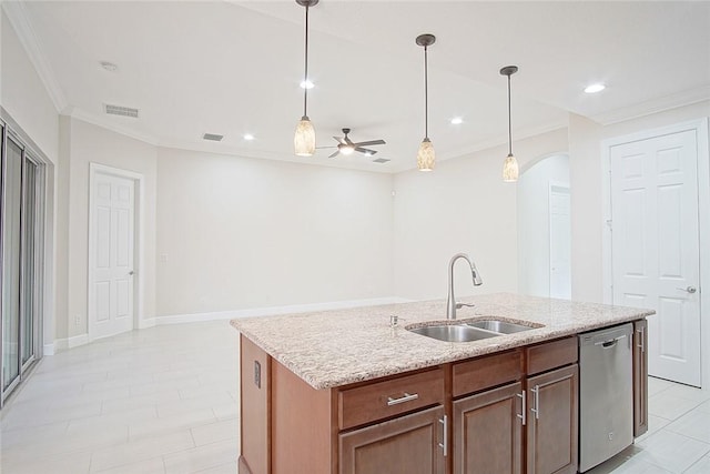 kitchen with stainless steel dishwasher, ceiling fan, sink, a center island with sink, and hanging light fixtures