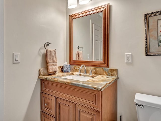 1516 50th Ct, Vero Beach, FL 32966 - half bathroom featuring vanity and toilet