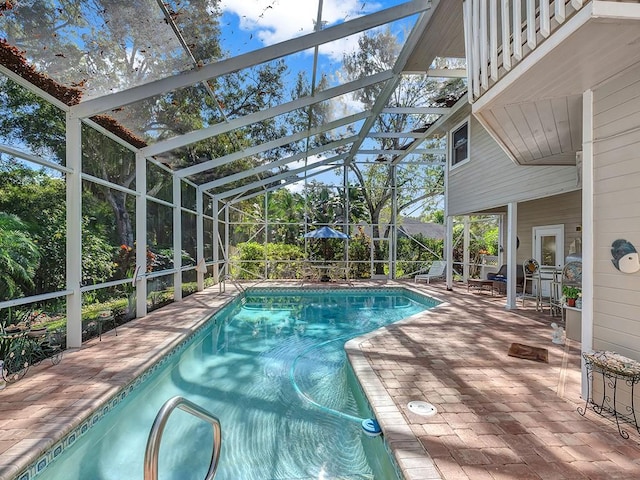 1516 50th Ct, Vero Beach, FL 32966 - outdoor pool with a patio and a lanai