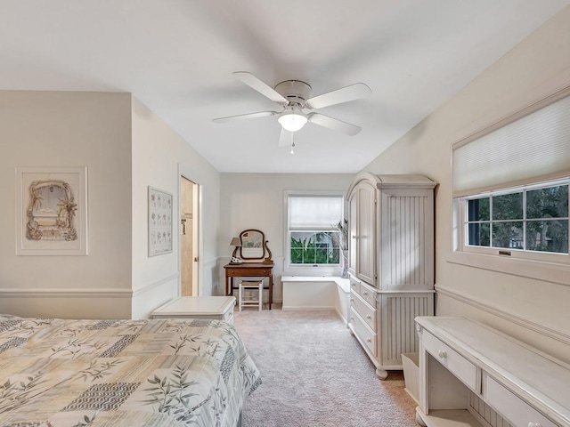 1516 50th Ct, Vero Beach, FL 32966 - bedroom with light colored carpet and a ceiling fan