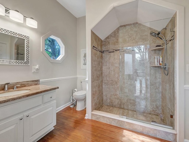 1516 50th Ct, Vero Beach, FL 32966 - full bath with vanity, tiled shower, and wood finished floors