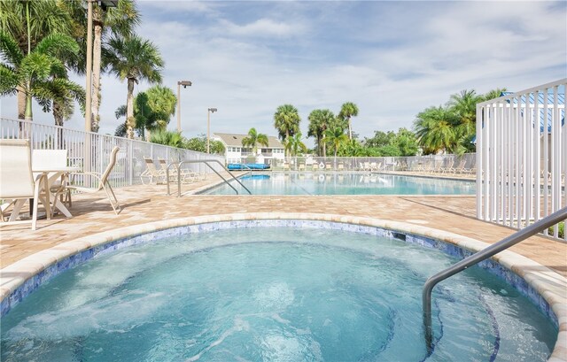 view of swimming pool featuring a patio