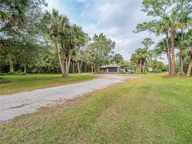 exterior space featuring a front lawn