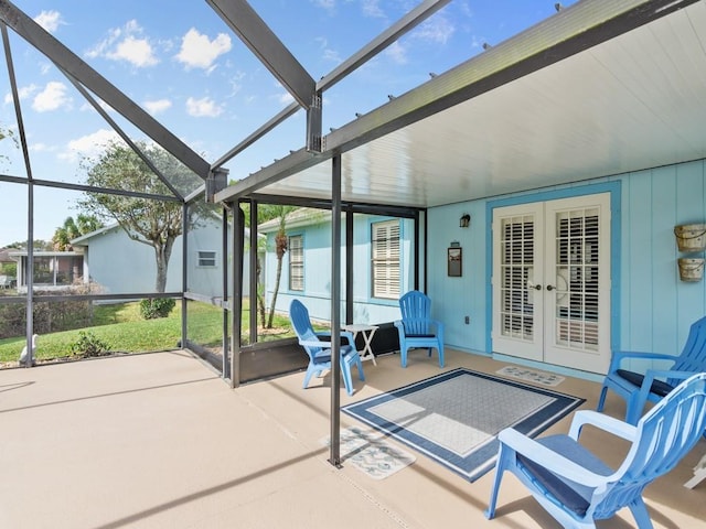 sunroom featuring french doors