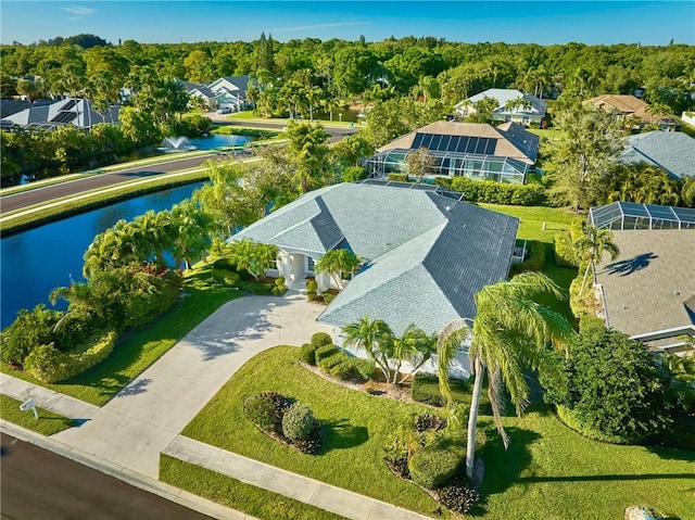 drone / aerial view with a water view