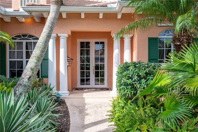 entrance to property featuring french doors