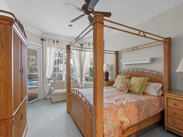 carpeted bedroom featuring a textured ceiling, access to exterior, ceiling fan, and crown molding