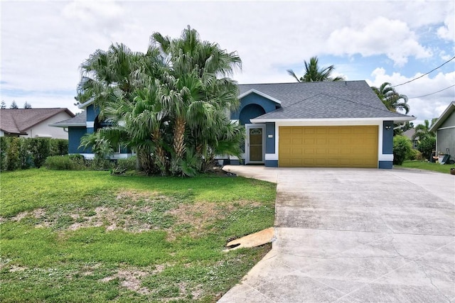 115 Larchmont Ter, Sebastian, FL 32958 - view of front facade featuring driveway, an attached garage, a front lawn, stucco siding, and roof with shingles