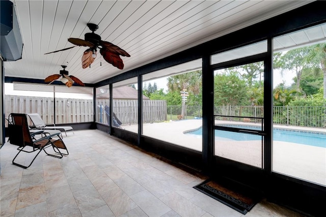 115 Larchmont Ter, Sebastian, FL 32958 - unfurnished sunroom featuring ceiling fan and plenty of natural light