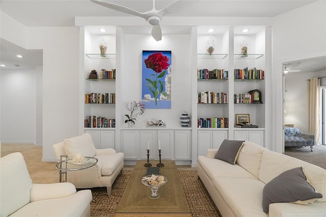 living room with built in features, ceiling fan, and recessed lighting