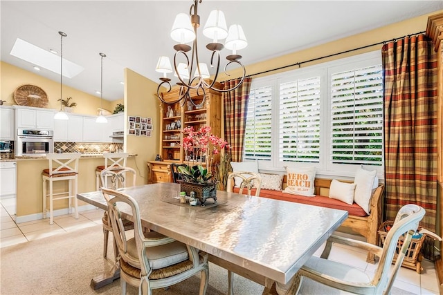 carpeted dining space featuring lofted ceiling and a chandelier